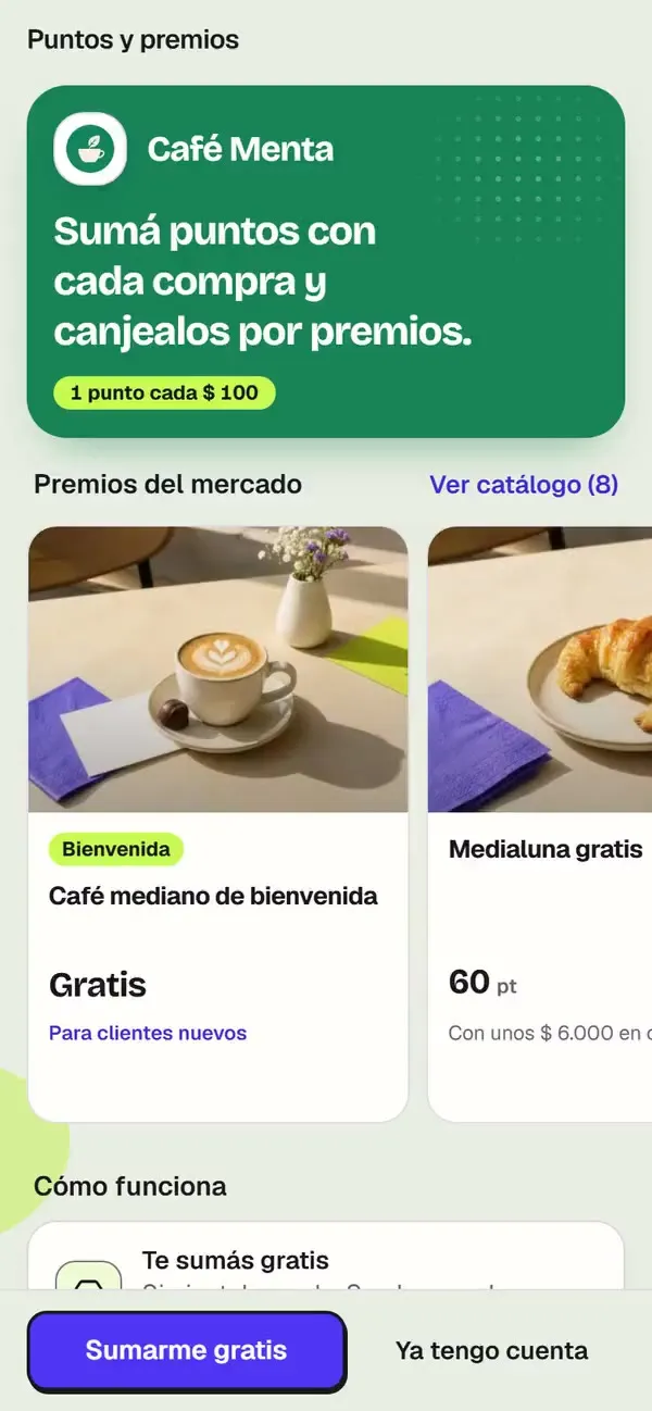 La vitrina de Café Menta en un teléfono, sin sesión: la marca y la regla de puntos arriba; al bajar, los premios con lo que hay que comprar para llegar, «Cómo funciona» y «Puntos que rinden más».